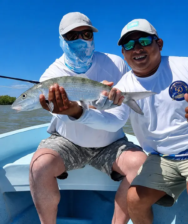 guide and client with a nice bonefish caught on the Cozumel flats