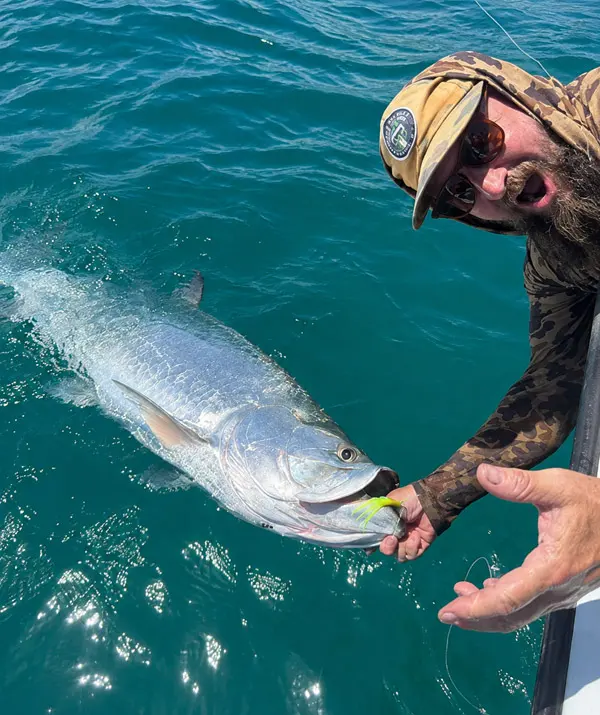 Customer landing a big Tarpon in Holbox